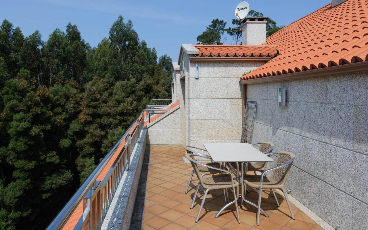 Apartamentos Trisquel Санхенхо Экстерьер фото